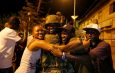 Gambians celebrate as West African troops enter capital after Jammeh flees